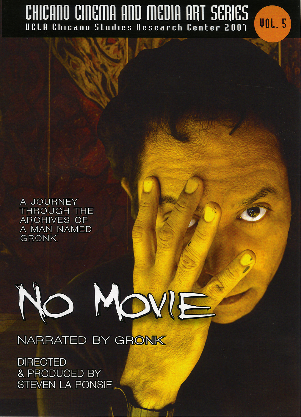 DVD cover with dark background and a close-up photo of the artist Gronk with one hand covering part of his face.
