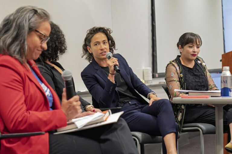 Paola Ramos (center) speaks on the panel at UCLA.
