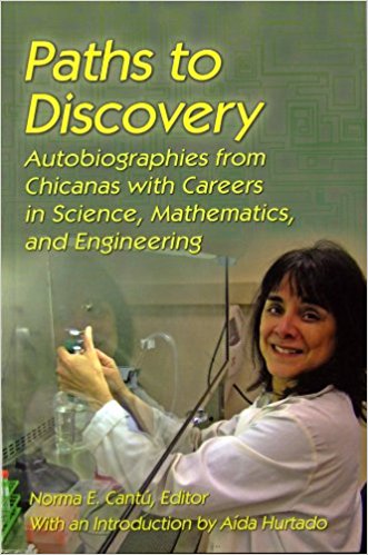 Green Paths to Discovery book cover with yellow text and a color photograph of a woman in a lab coat working with lab equipment.