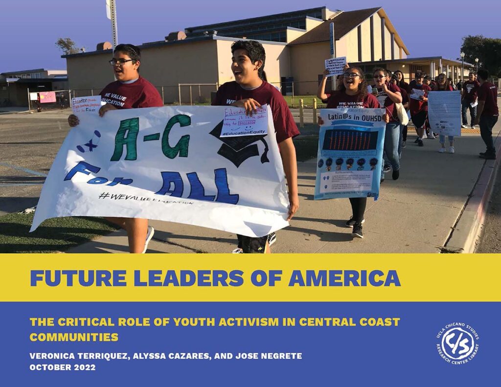 Blue and yellow report cover showing a photo of about twenty young people marching outdoors while carrying signs and banners.