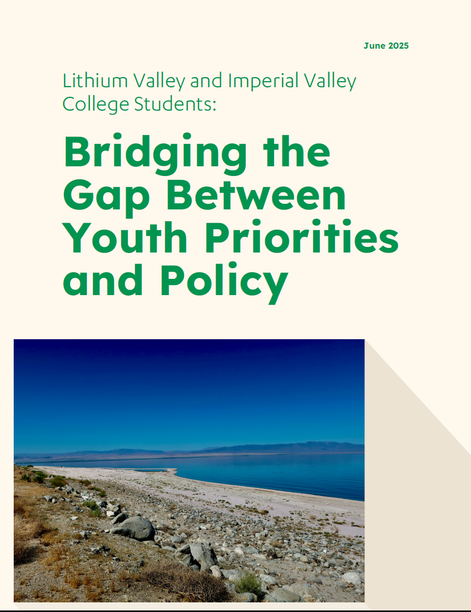 Research report cover with large green text and a photo of a rocky shoreline beside blue water with mountains in the distance.