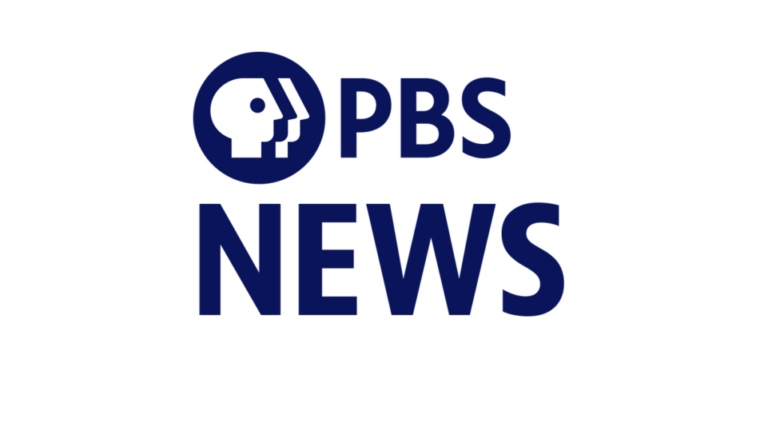 PBS News logo in dark blue text with the PBS profile icon above the word "news" on a white background.